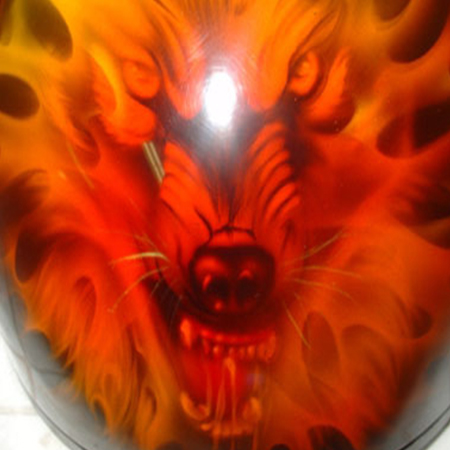 wolf on fire on motorcycle helmet